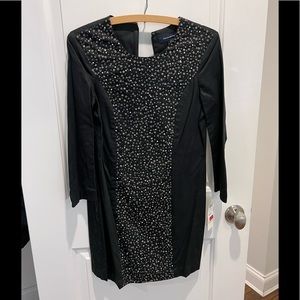 Never worn black dress with cream and gold beads down the middle